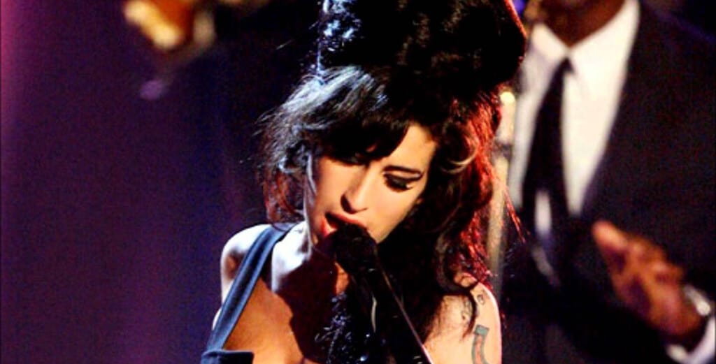 Amy Winehouse singing.