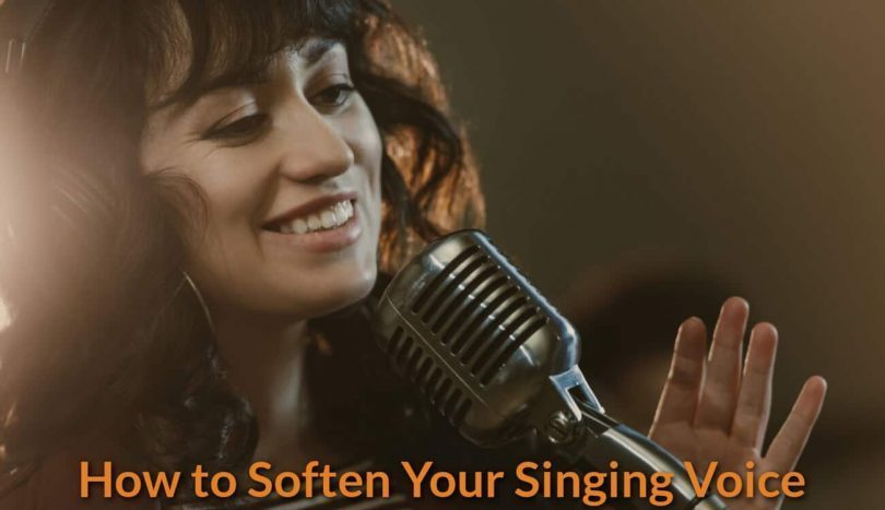 A female singing with smile.
