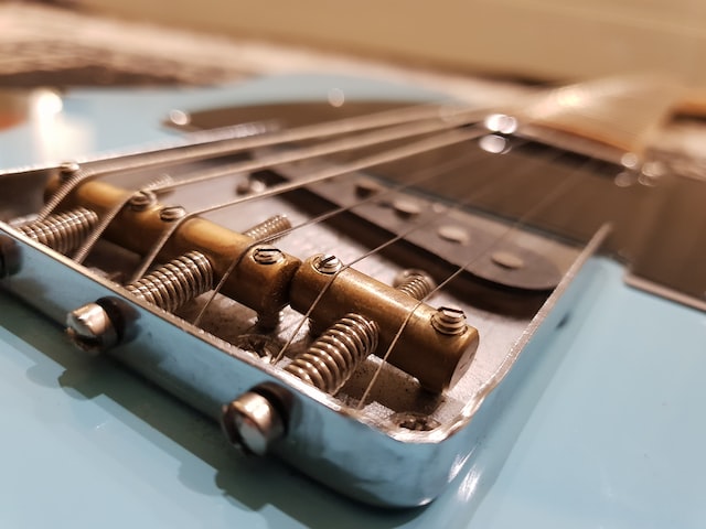 Re-String Your Guitar Re-String Your Guitar